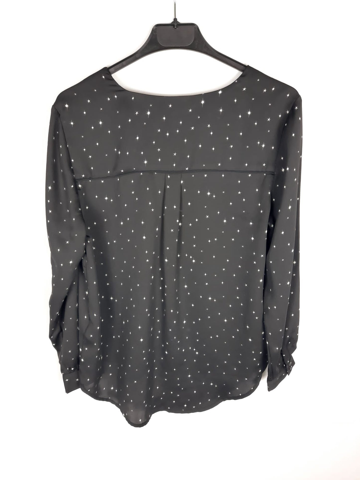 H&M. Blusa fluida negra estrellas T.34