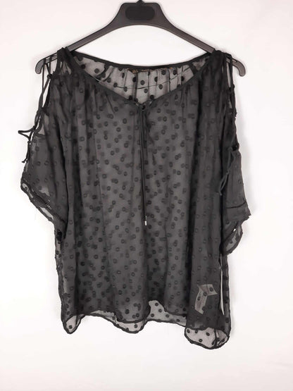 ZARA. Blusa negra semitransparente negra con topitos T.s