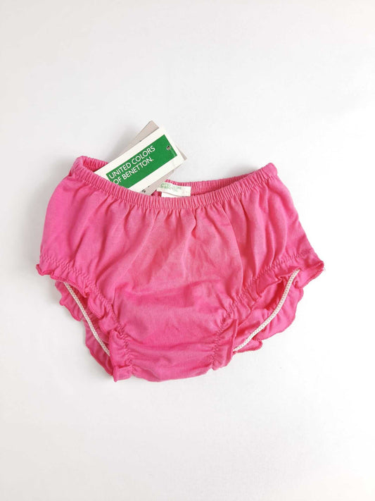 BENETTON. Braguita rosa fucsia T.6-9 m