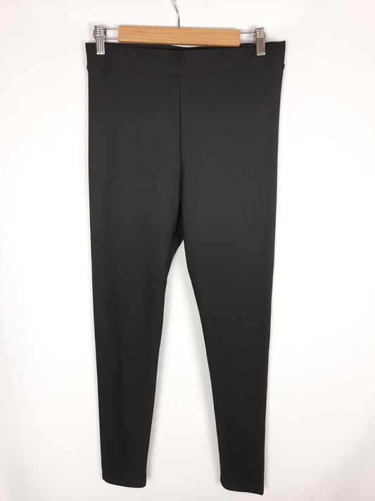 H&M. Pantalon negro tipo leggins T.m