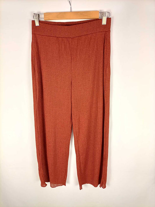 ZARA. Pantalones semitransparentes color teja T. s