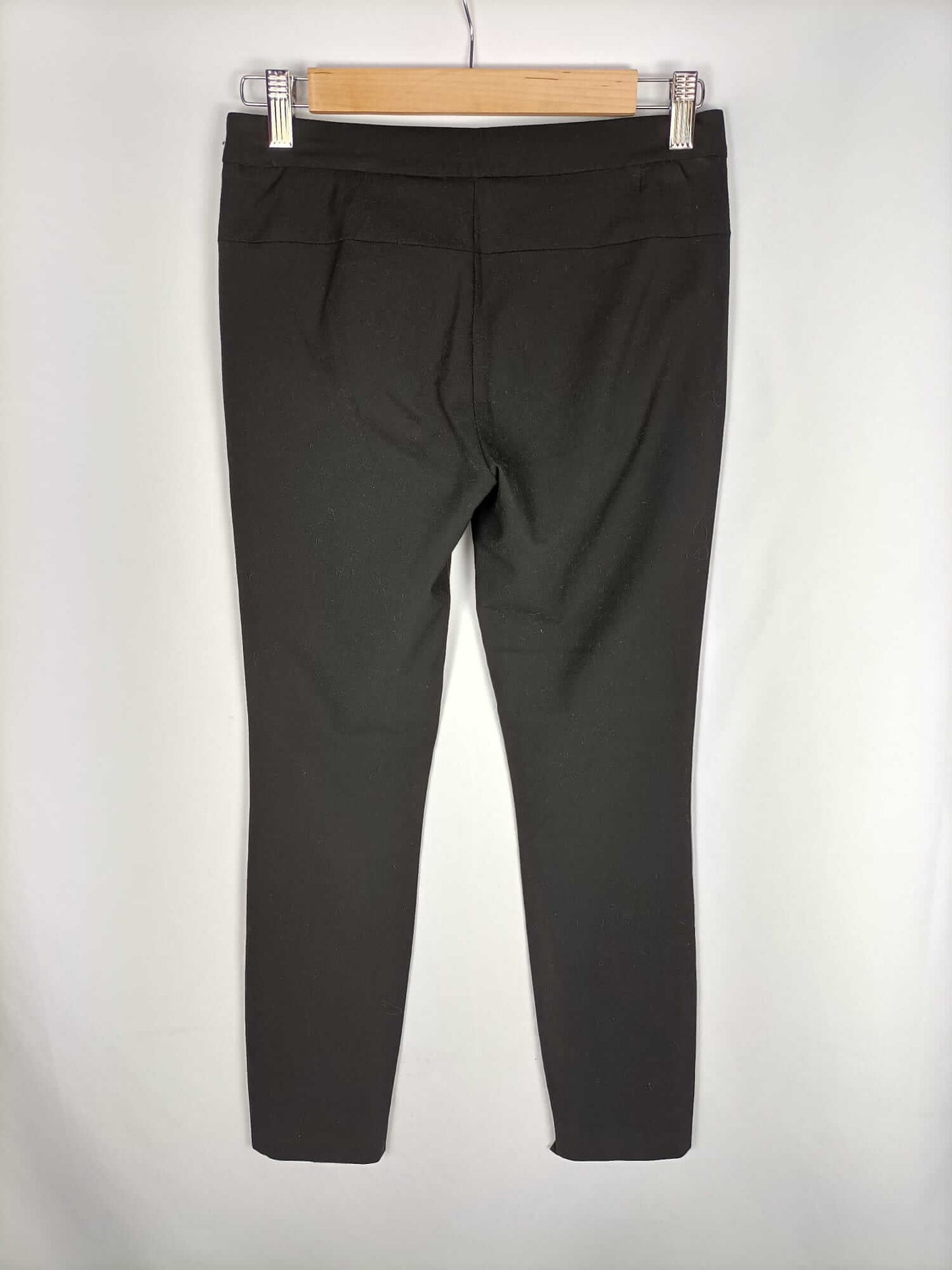 ZARA.Pantalones negros ajustados elásticos T.32