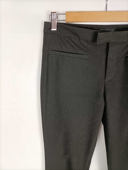 ZARA.Pantalones negros ajustados elásticos T.32