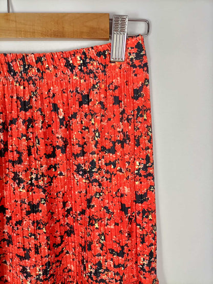 ZARA.Falda corta naranja estampada con volante T.s