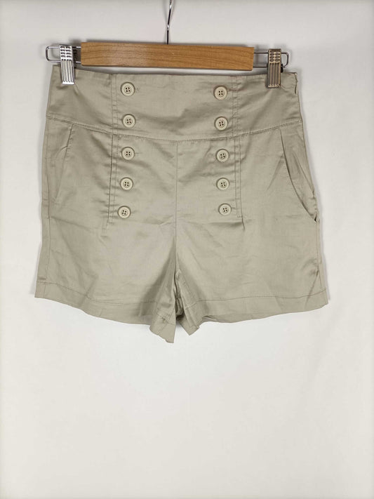 OTRAS.Shorts beige botones T.s