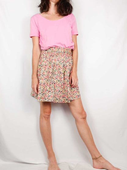 H&M.Falda corta flores T.xs