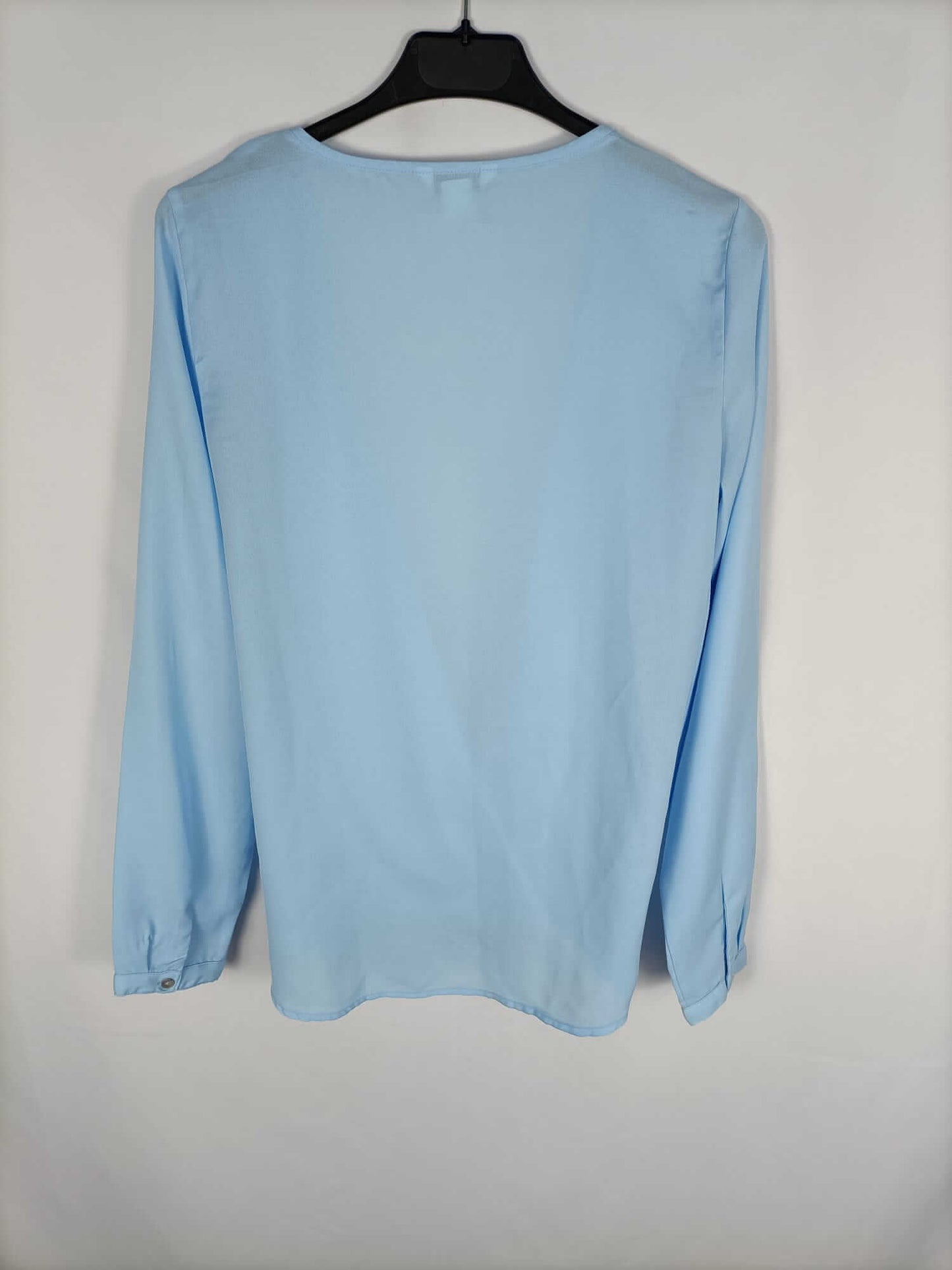 BLANCO.Blusa azul cruzada T.s