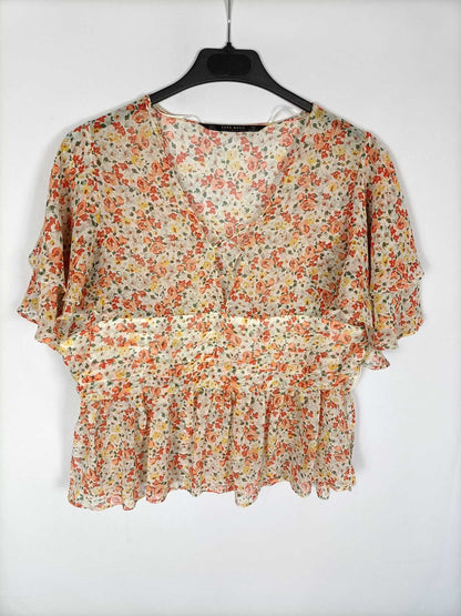 ZARA.Blusa flores volantes T.L