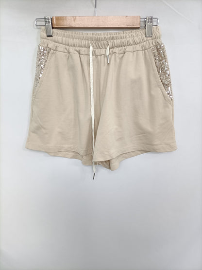 OTRAS. Pantalón beige lentejuelas T.s/m