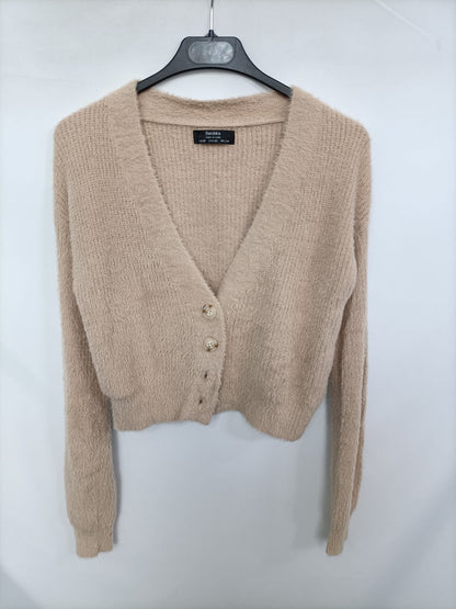 BERSHKA. Rebeca beige pelito T.s