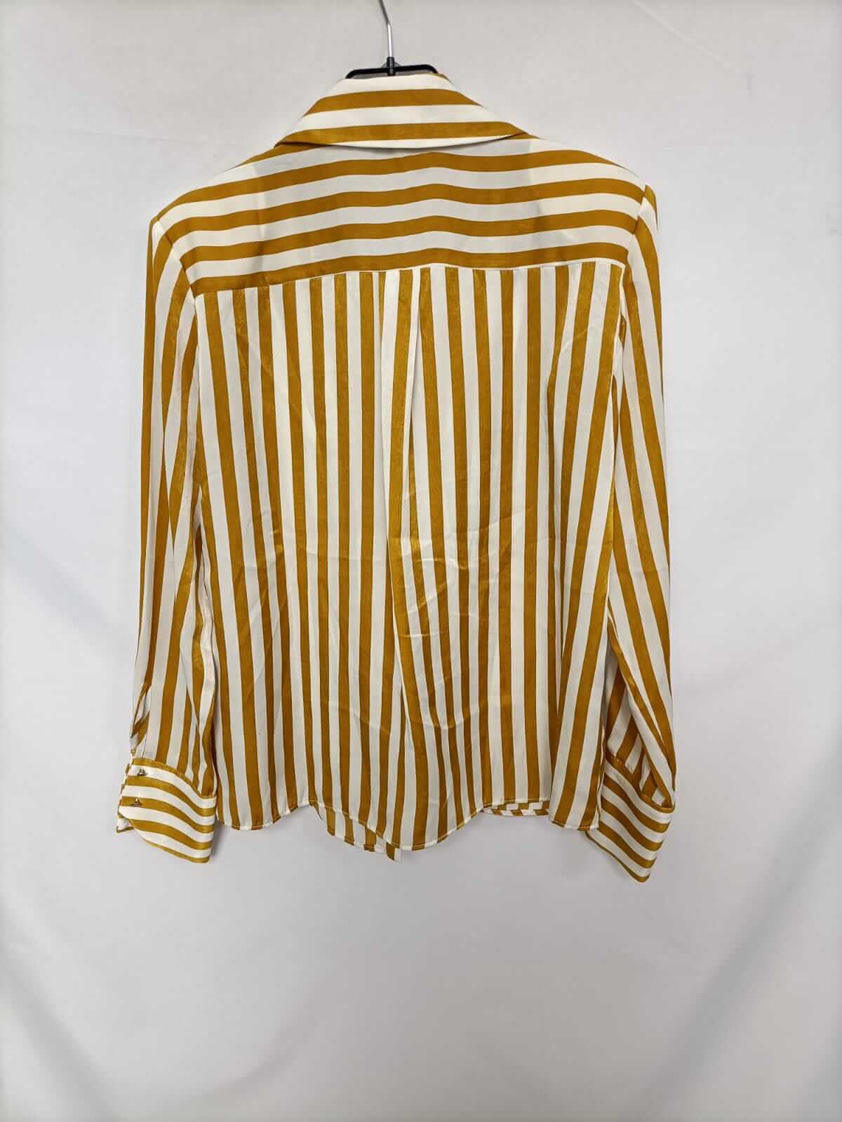 ZARA. Blusa de rayas y volante T.xs