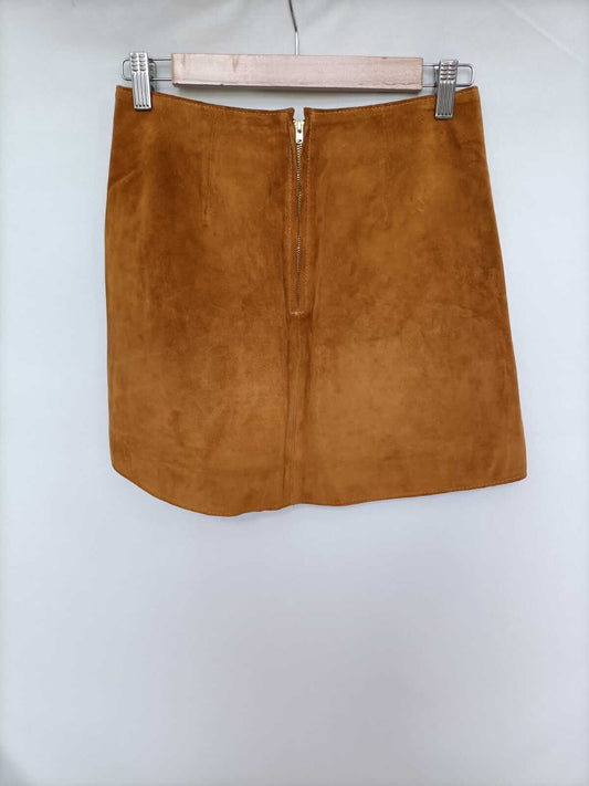 ZARA. Falda corta piel camel T.xs