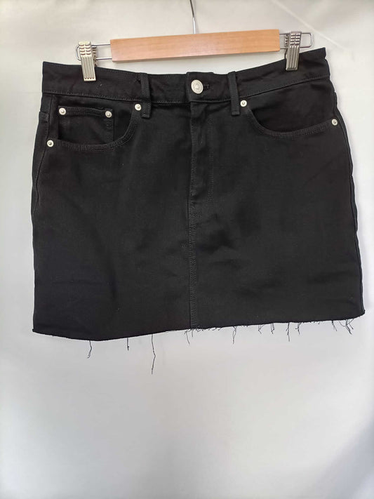 ZARA. Falda denim negra T.l