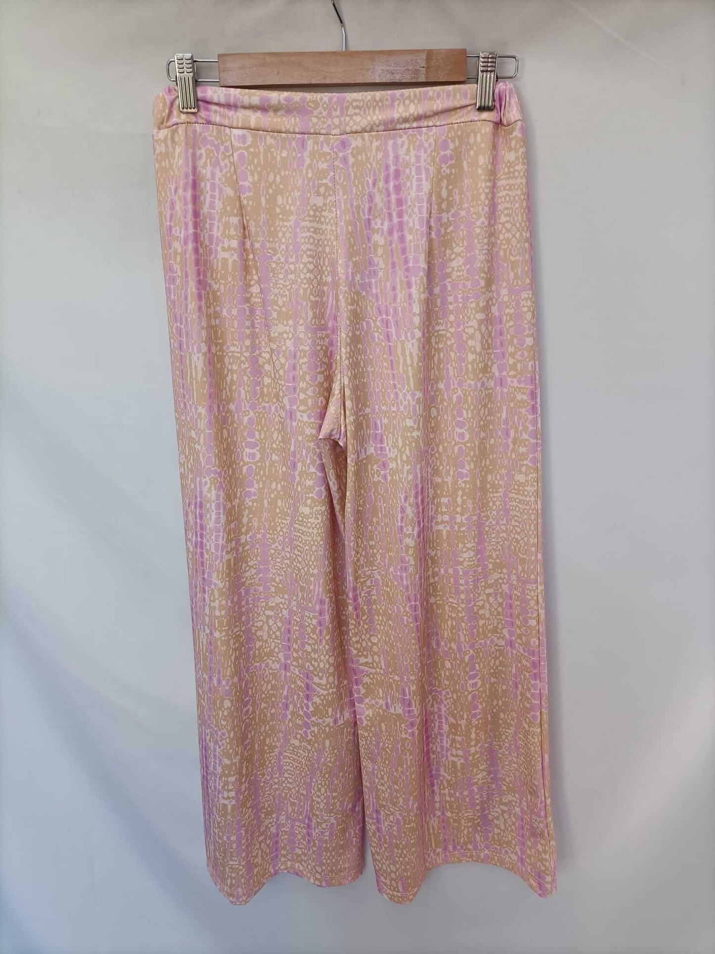 PINPON LILI. Pantalón estampado tono rosa y naranja tu (m/l)