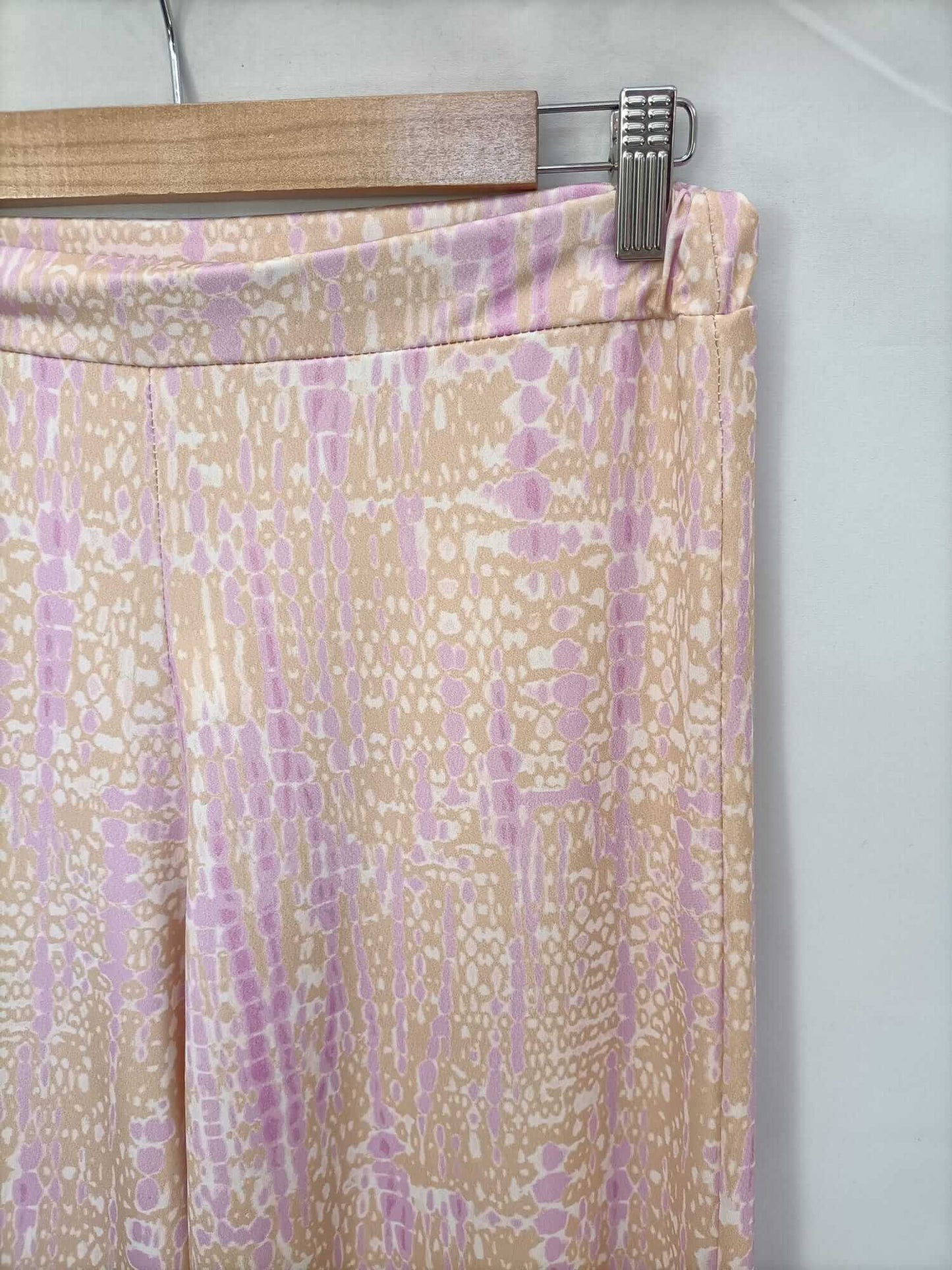 PINPON LILI. Pantalón estampado tono rosa y naranja tu (m/l)