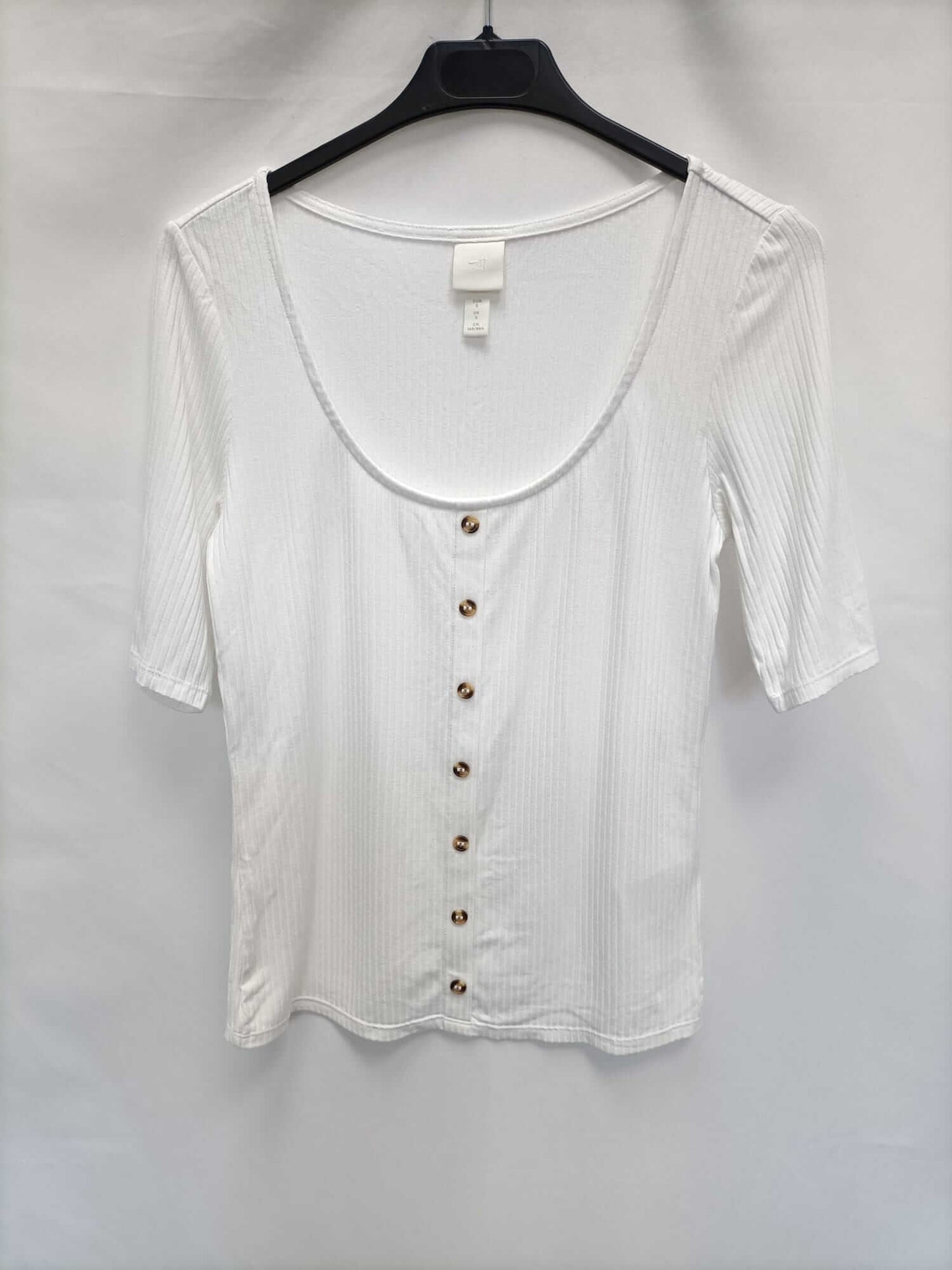 H&M.Top punto blanco canalé T.s