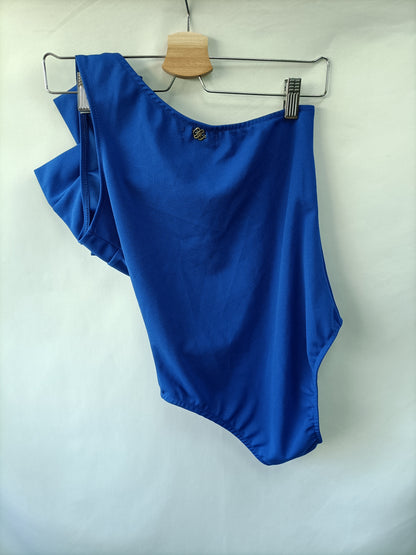 CUPLÉ. Body azul lazo T.xs