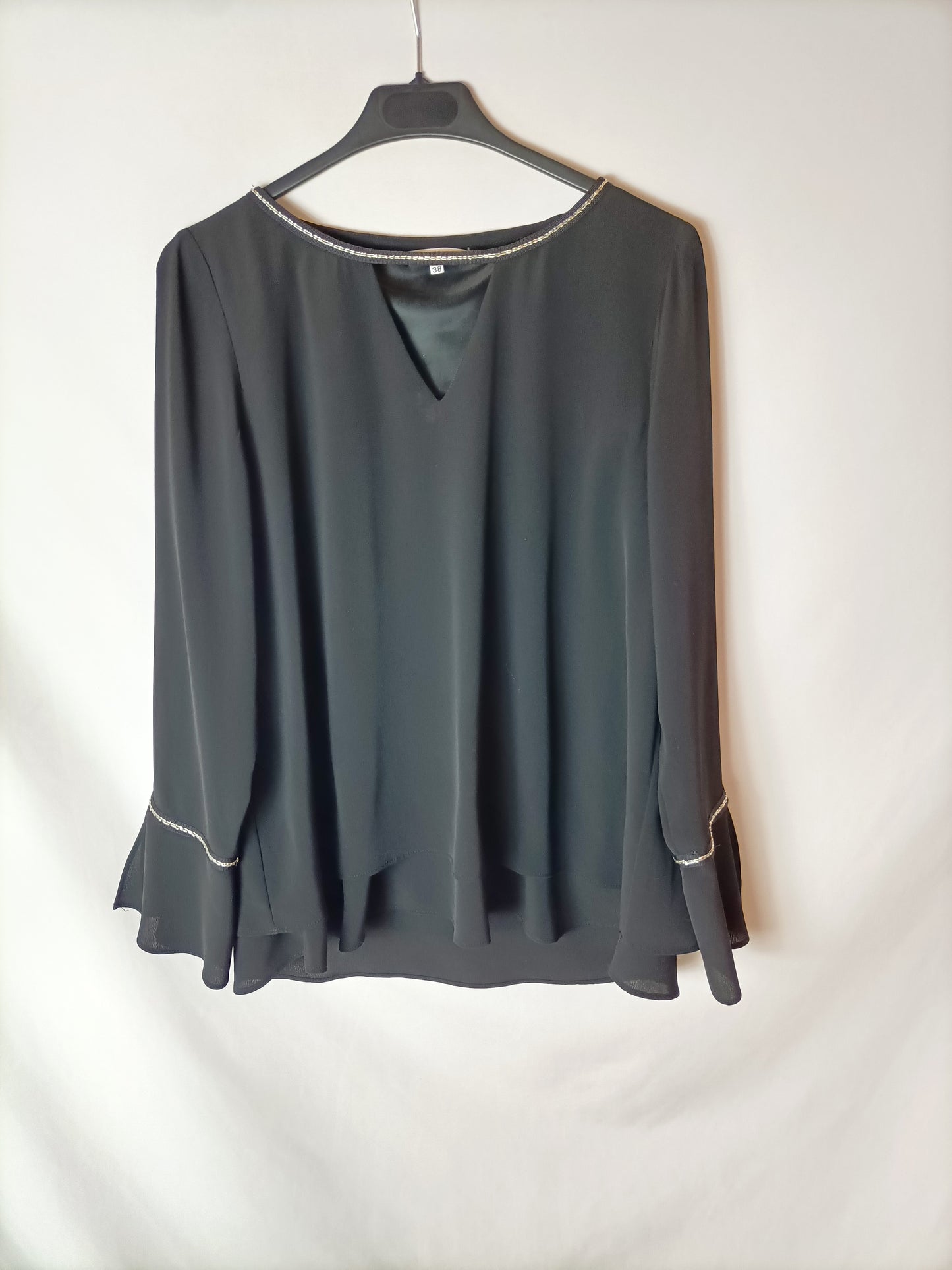 FORMAULA JÓVEN. Blusa negra plateados T.38