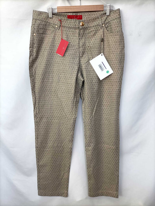 ANDY D'AURIA. Pantalón estampado dorado y negro T.44