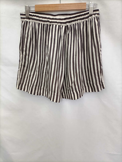 H&M. Shorts fluido rayas T.38