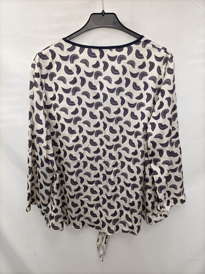 MERLTTI.Blusa beige estampado T.46