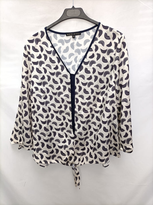 MERLTTI.Blusa beige estampado T.46