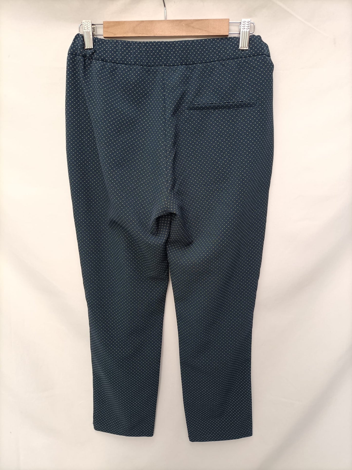 ZARA. Pantalón azul florecitas T.s