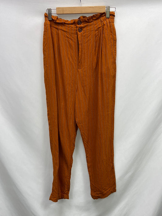 SFERA. Pantalón naranja rayas T.38