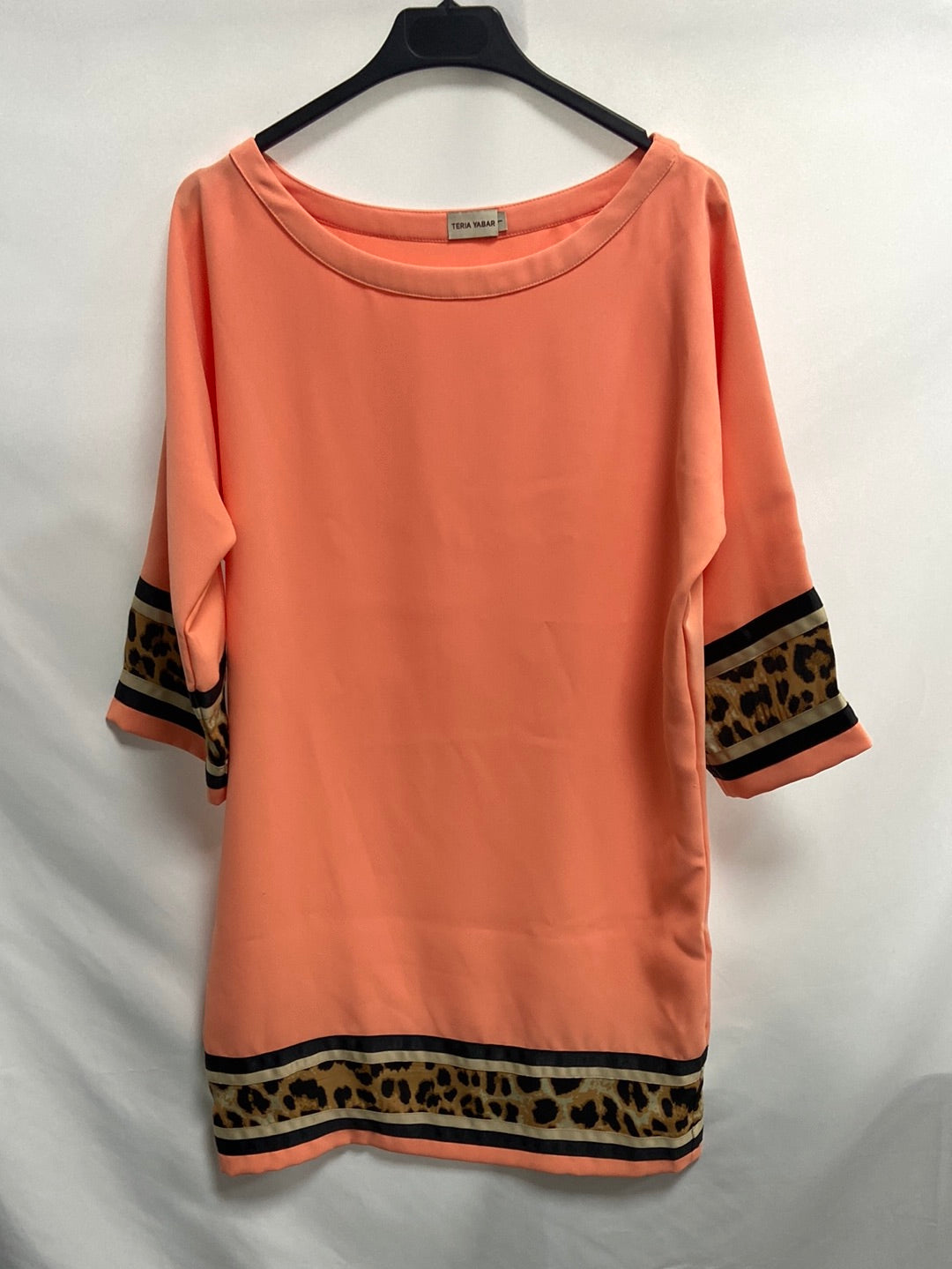 TERIA YABAR.Vestido naranja palo animal print T.S