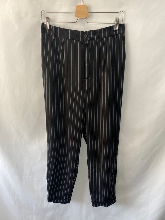 ZARA. Pantalón negro rayas blancas T.s