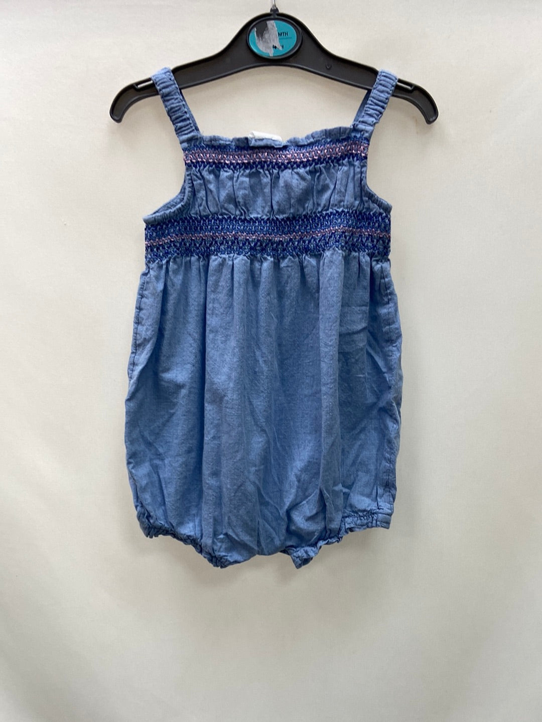 H&M. Mono tipo body denim T4-6 meses