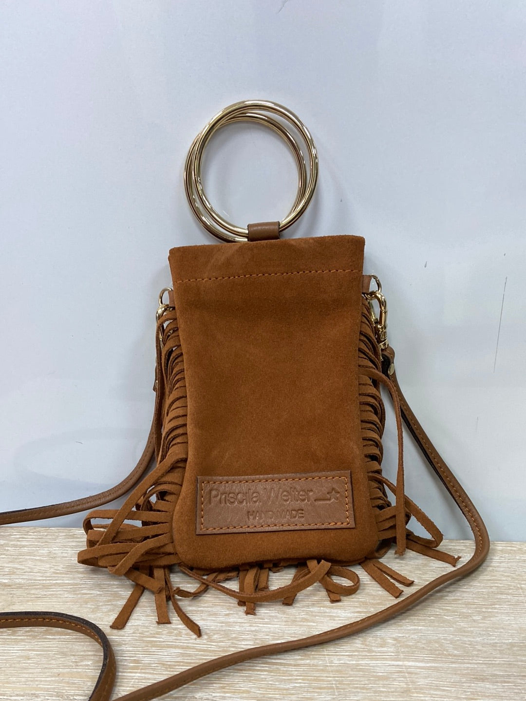 PRISCILA WELTER.Bolso piel camel flecos