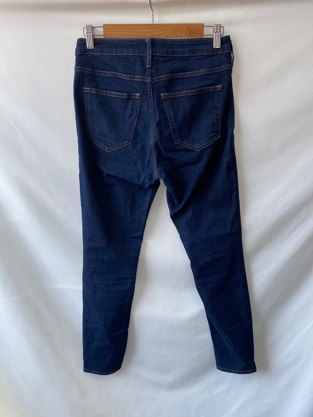 H&M.Pantalones pitillo denim oscuro T.38