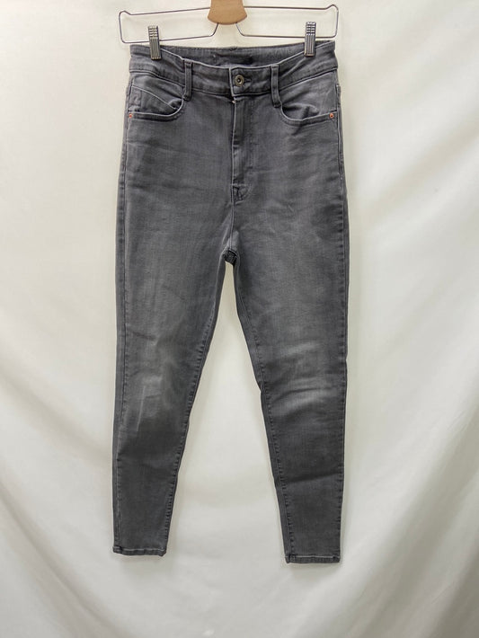 ZARA.Pantalones vaqueros grises T.38