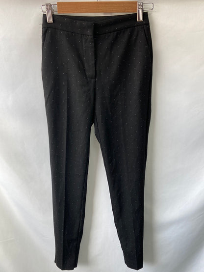 ZARA.Pantalones negros puntitos T.XS