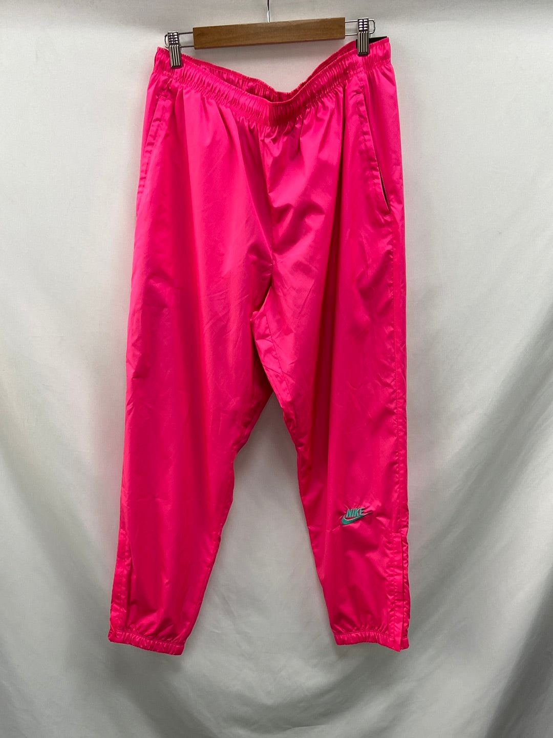 NIKE.Pantalones Rosa fosforito impermeables T.40