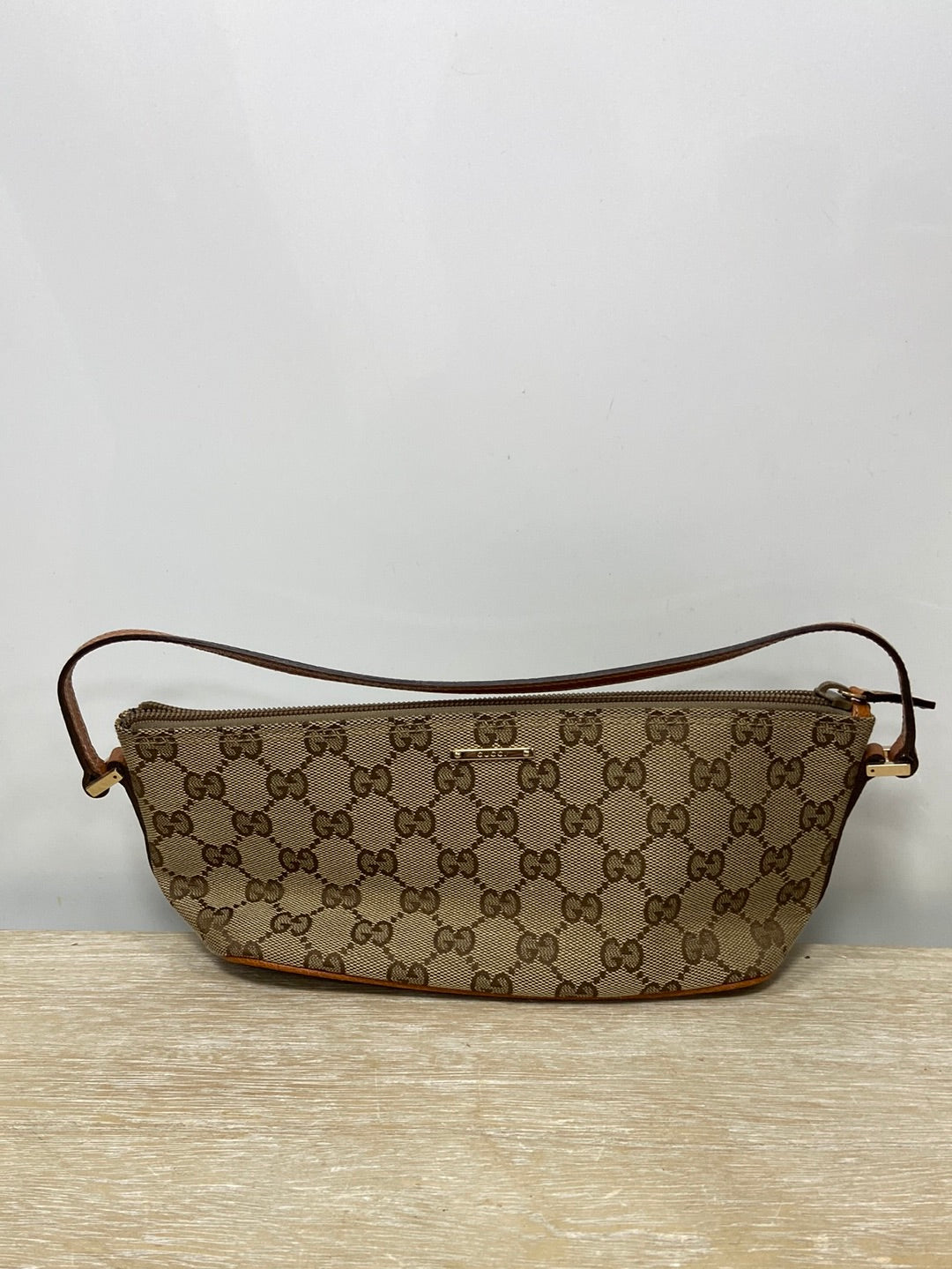 GUCCI. Bolso beige anagrama