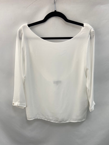 BY CLÉA. Blusa blanca espalda baja T.s y T.m