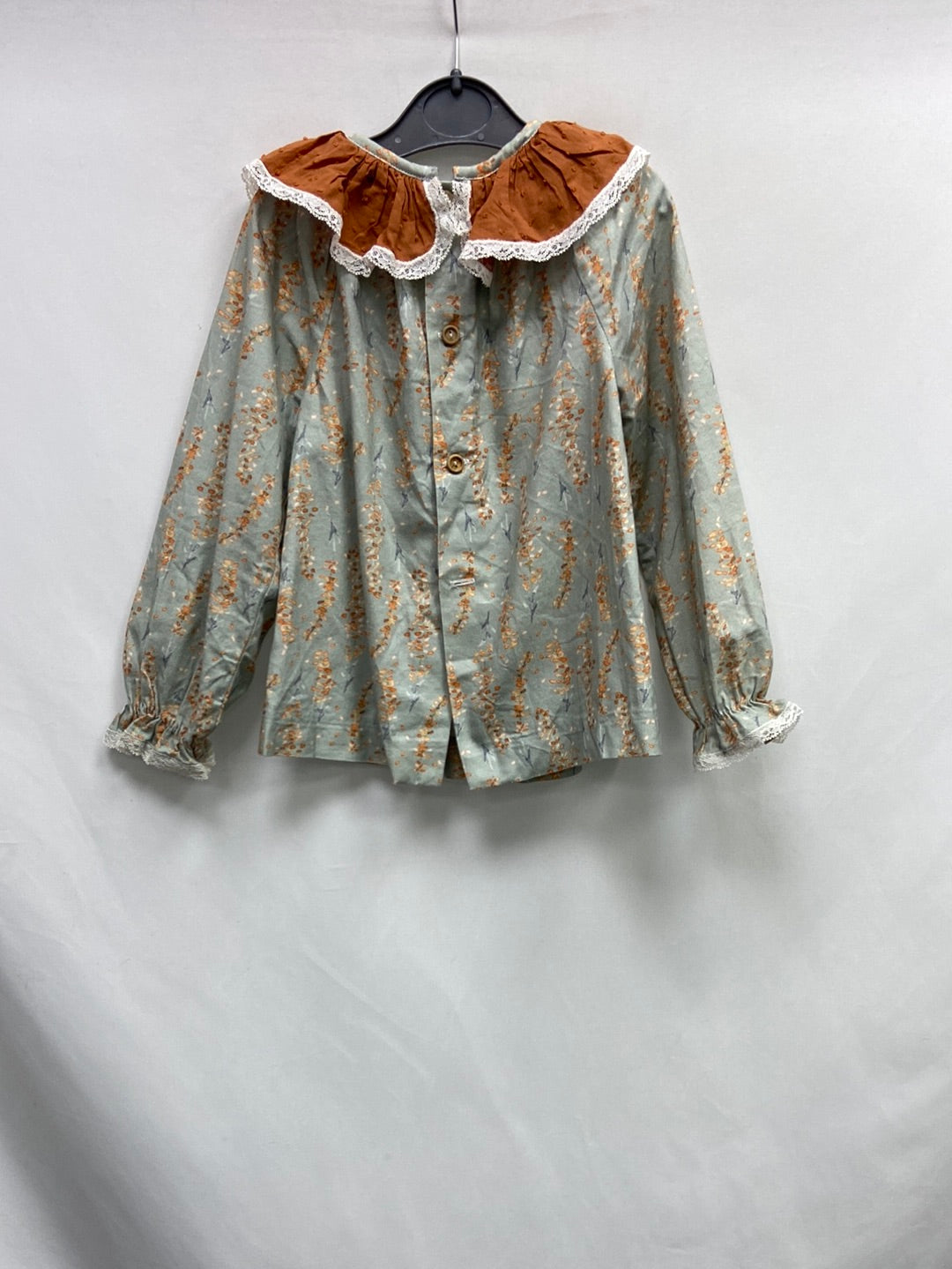 BIRINIT.Blusa verde flores 4 años