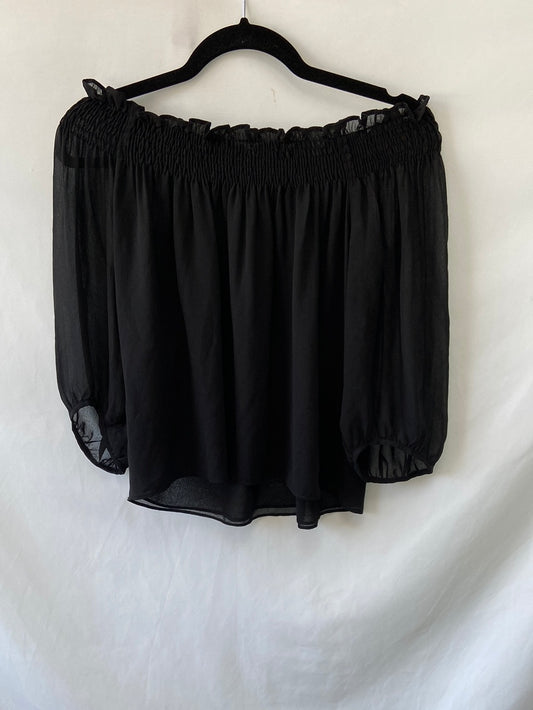 ZARA.Top negro plumeti cuello barco T.xs